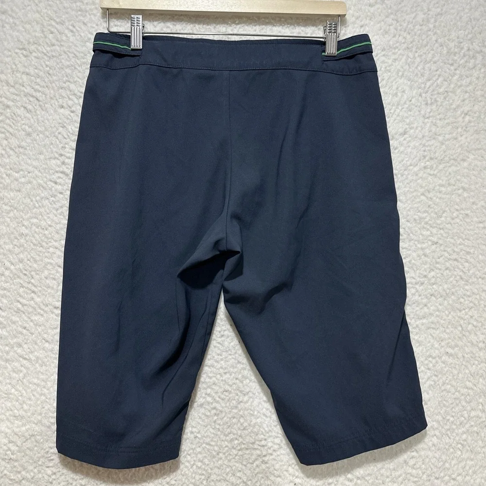 Nike Dri-Fit Sportswear‎ Shorts Size M Navy Featuring Green Stripes on the Sides